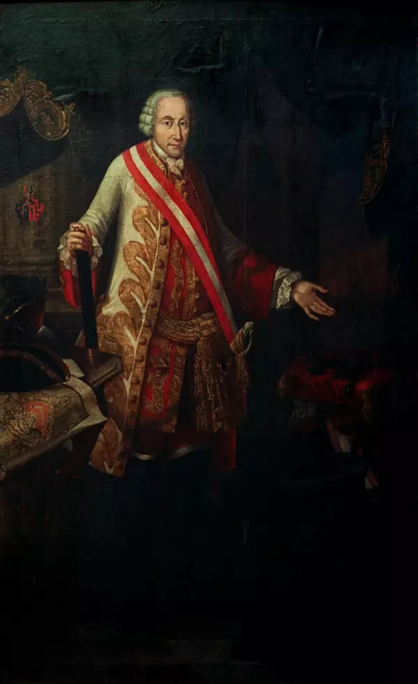 Polní maršálek Ernst Dietrich Marschall říšský hrabě von Burgolzhausen. Olejomalba Johanna Dominika Kleina st. z roku 1759. Polní maršálek oděný do kabátce a ozbrojený kordem drží v pravici maršálskou hůl, jíž se opírá o stůl se šachovanou orlicí na trnoži, a je dekorován velkokřížem Vojenského řádu Marie Terezie s řádovou šerpou. Na plánu Olomouce položeném na stole je červeně vyznačena obranná linie po eventuálním prolomení fortifikací pruským nepřítelem, na ploše stolu leží též dopis, třírohý klobouk a vavřínem ověnčená přilba. Postava v livreji klečící v levém rohu obrazu drží na hlavě červenou podušku s klíči od bran města Olomouce, jehož panorama je vidět oknem; dále jsou zde vyobrazeny hmoždíř, dvě dělové hlavně, kolová loukoť se špicemi, tři dělové koule a dva granáty. Pod maršálkovým rodovým erbem umístěném vpravo na sloupu se nachází latinský nápis „Magno aC gLorIoso CIVIs / DefensorI (Velkému a slavnému obránci měšťanů)“ s chronogramem 1759. Vlastivědné muzeum v Olomouci, inv. č. V 1793, foto Pavel Rozsíval.